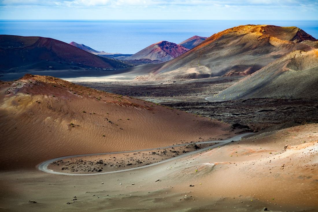 Volcanic cones in shades of ochre and rust at Timanfaya